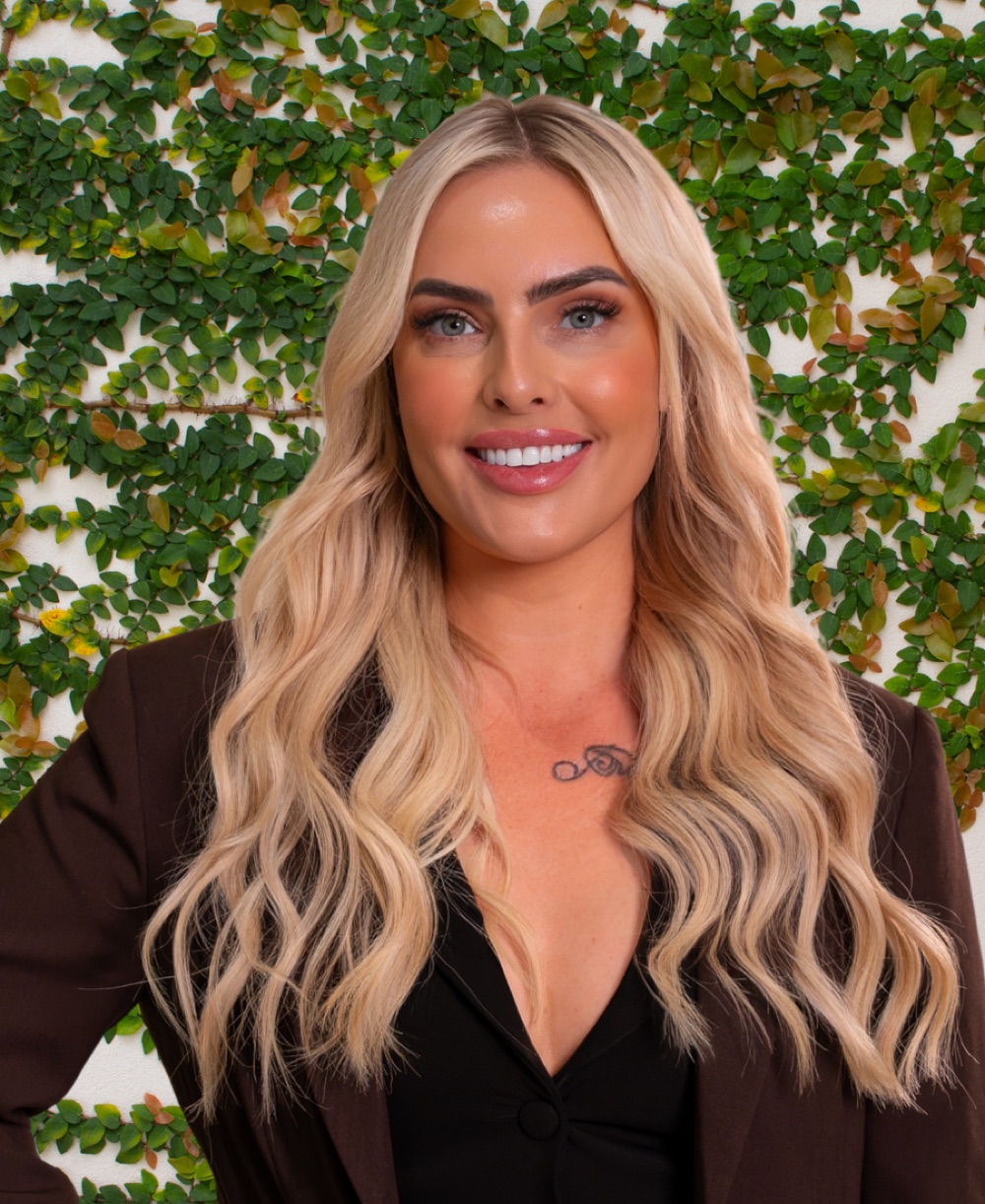 Emma Grant, real estate agent with Ray White Malan + Co on the Northern Gold Coast